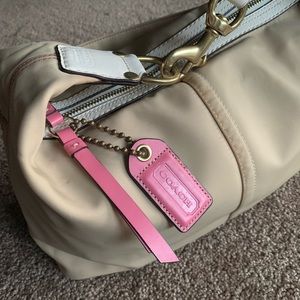 Cream and Pink Coach purse